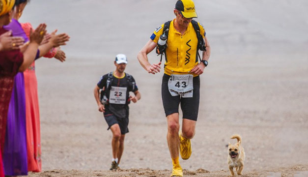 perrita y atleta-xinhua